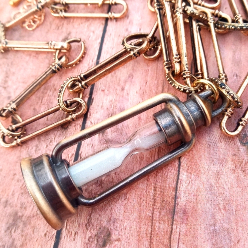 Hour Glass Pendant on GLD chain Necklace